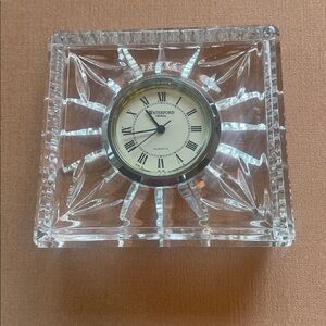 Waterford crystal desk clock.  Needs battery change.  Slight flaw as shown.